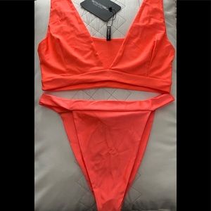 Neon orange swimsuit!